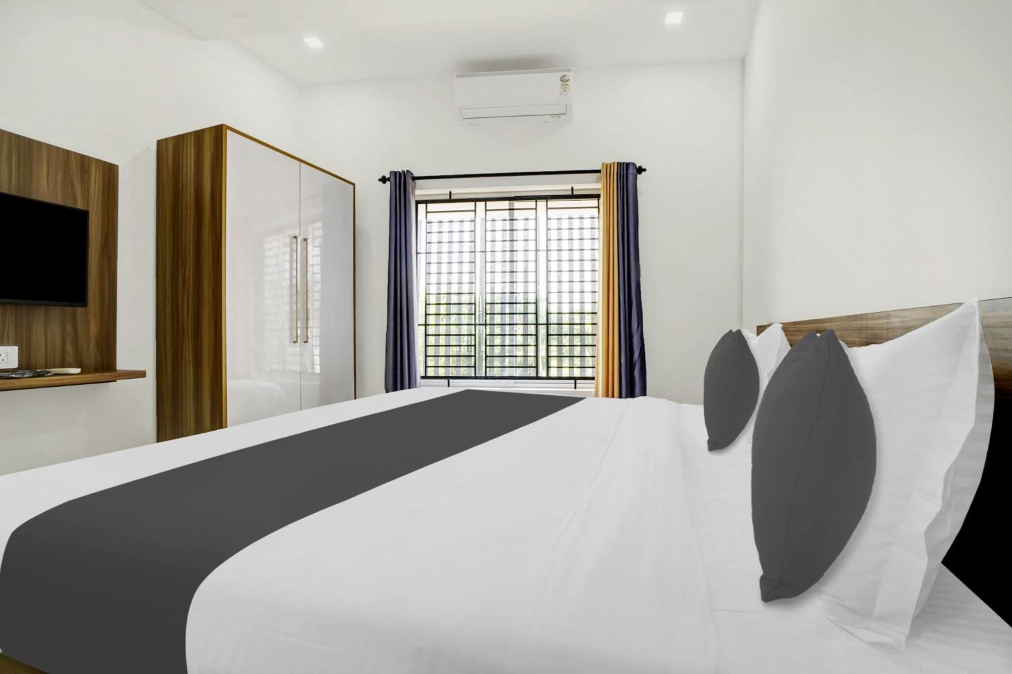 Hotel O Grand Parassini Pappinisseri ภายนอก รูปภาพ