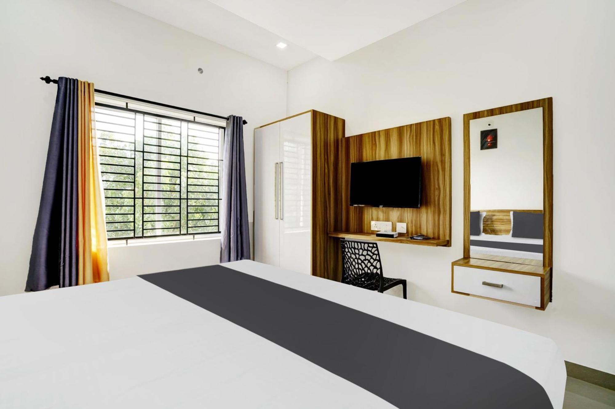 Hotel O Grand Parassini Pappinisseri ภายนอก รูปภาพ