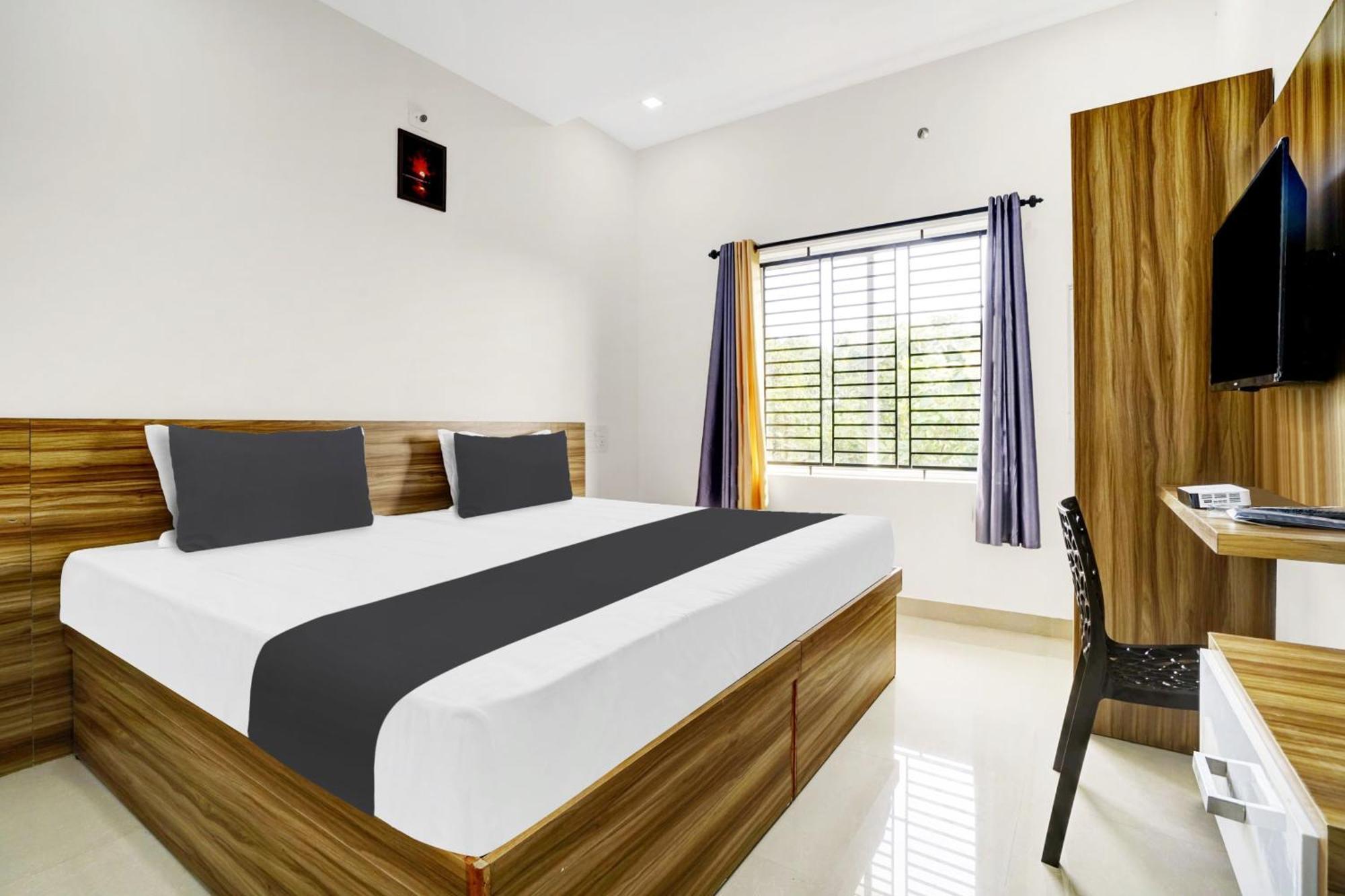 Hotel O Grand Parassini Pappinisseri ภายนอก รูปภาพ